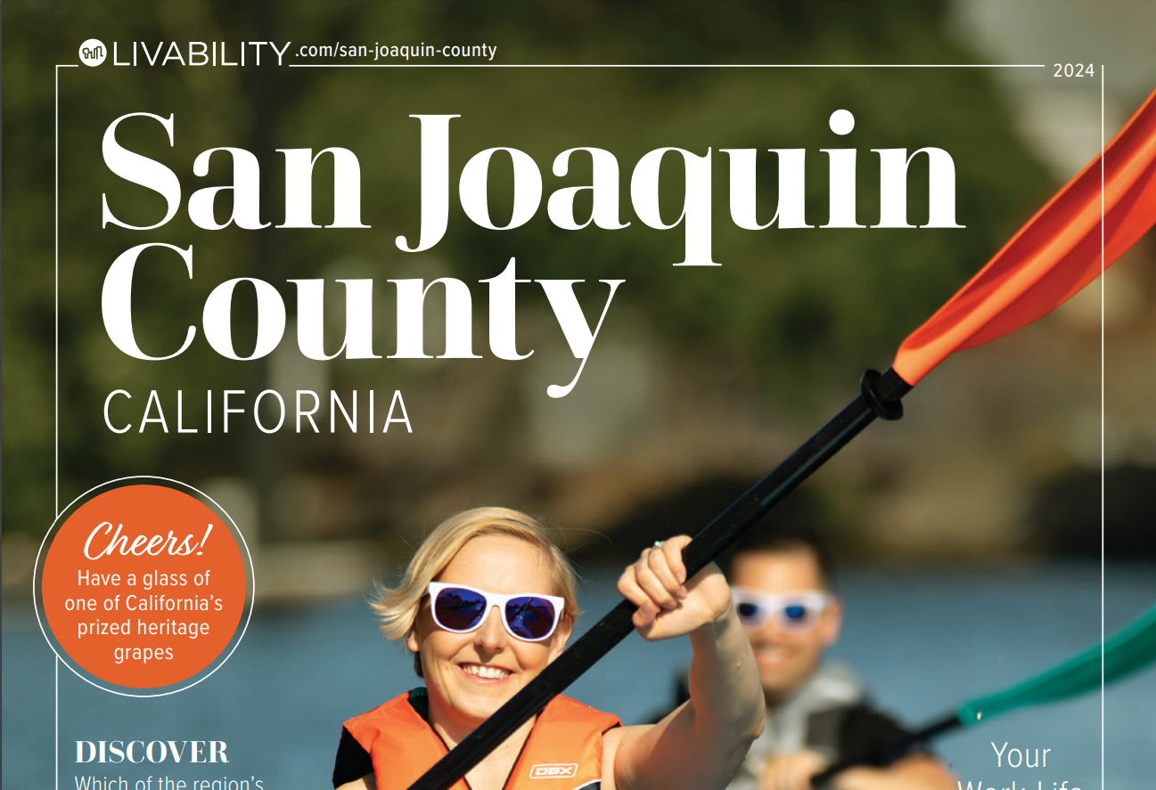 Cover of Livability Magazine depicting a couple kayaking in San Joaquin