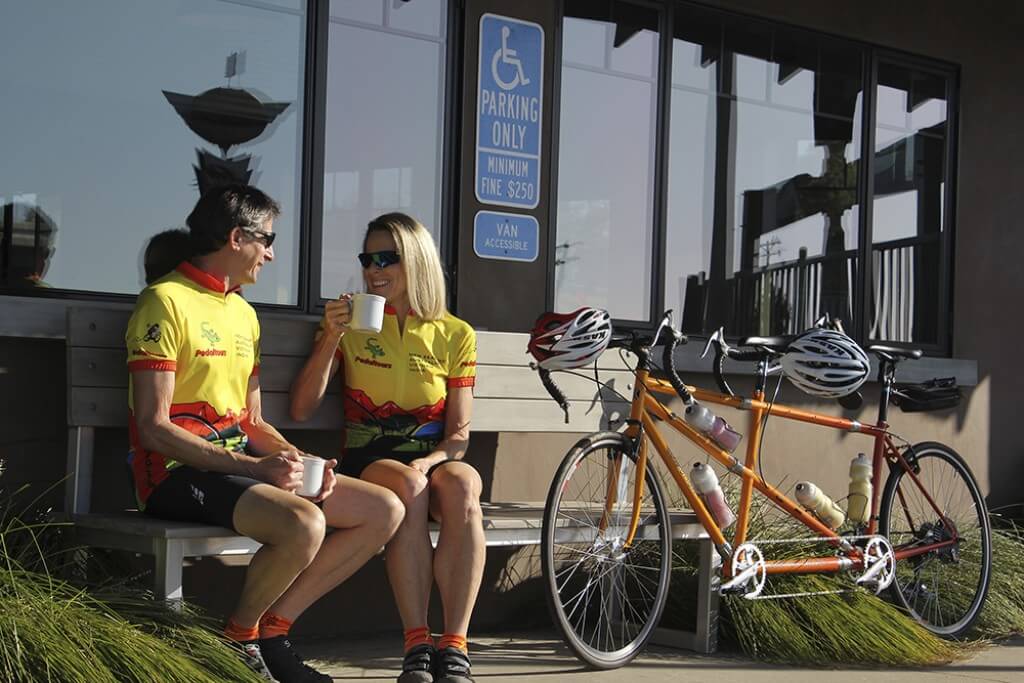 Bicyclists having coffee